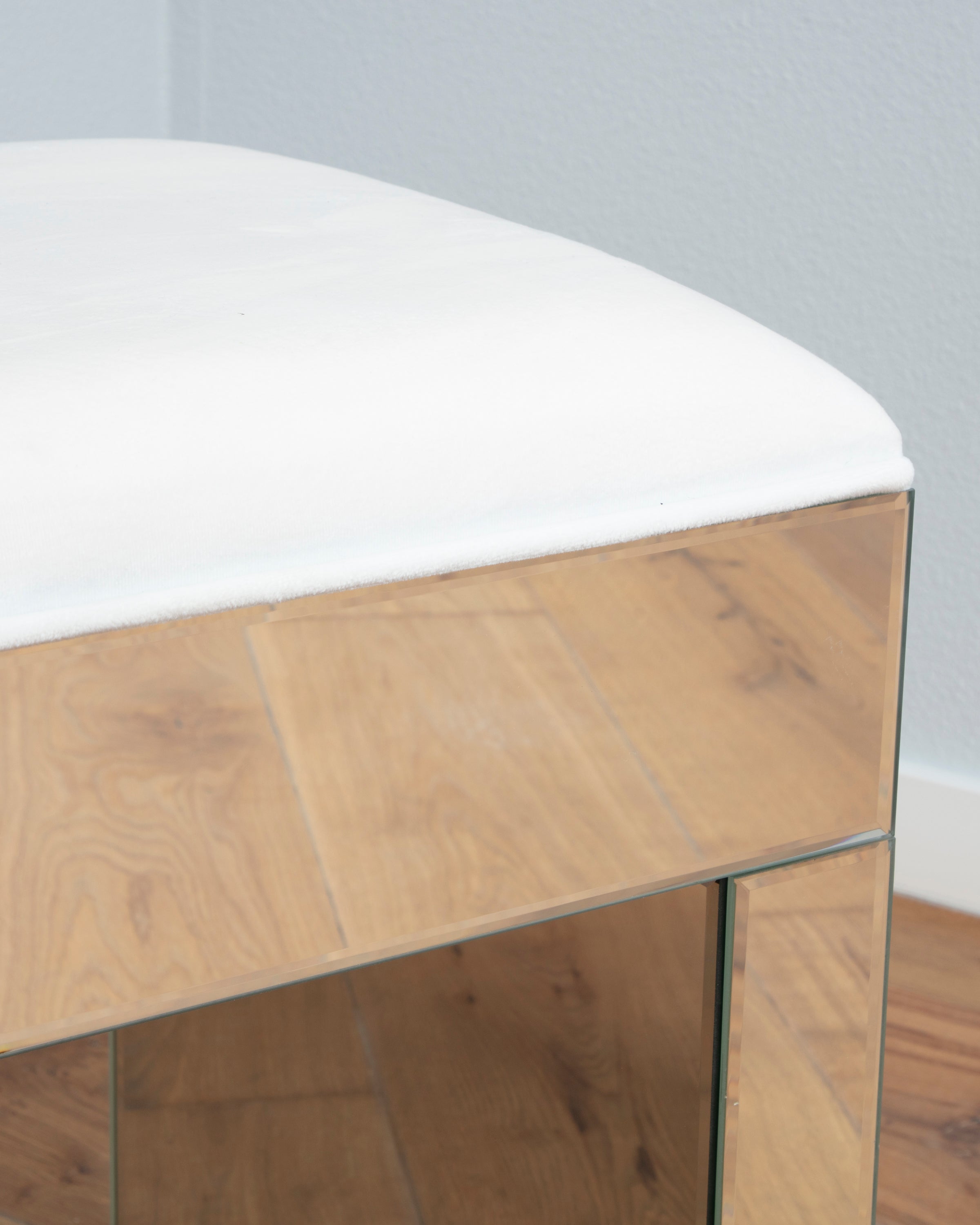 the mirrored vanity stool