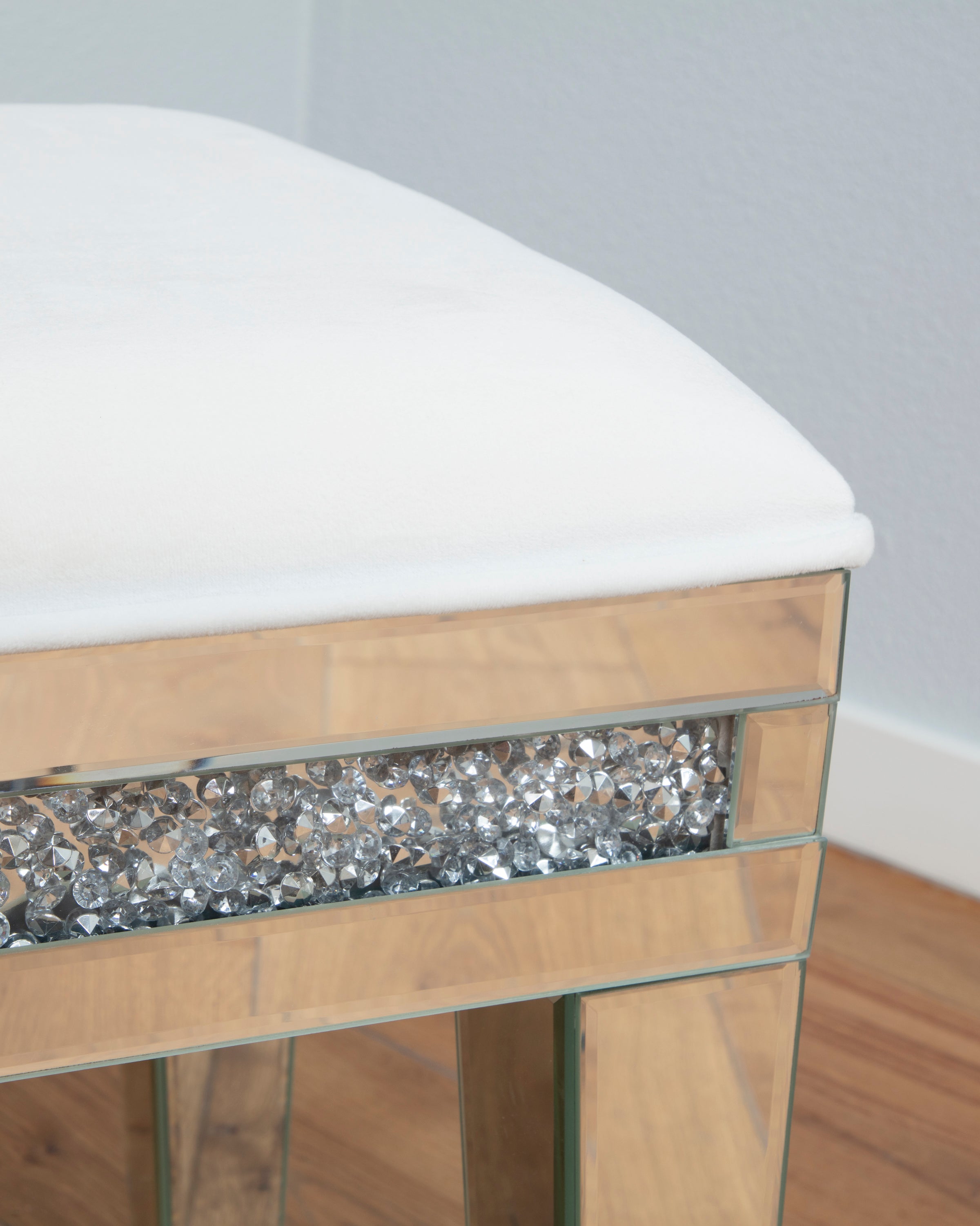 THE MIRRORED CRYSTAL STOOL