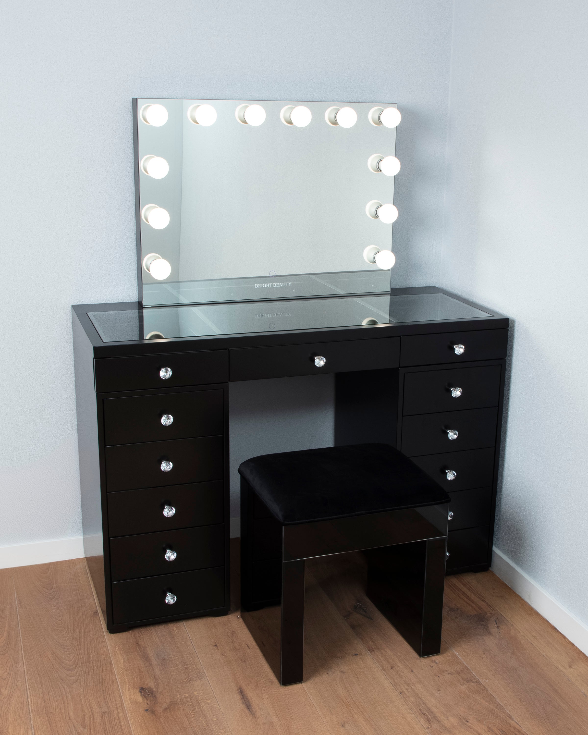 The black vanity stool