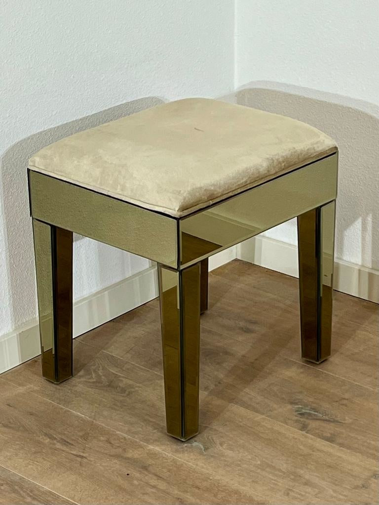 The champagne gold vanity stool